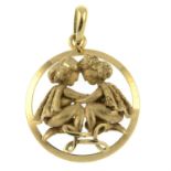 A 9ct gold Gemini pendant.