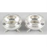 A pair of early Victorian silver salt cellars.
