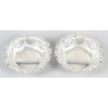 A pair of late Victorian silver pierced bonbon dishes.