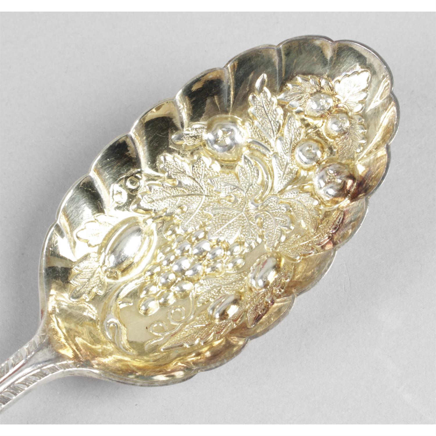 A cased set of four late Victorian silver fruit serving spoons. - Image 2 of 3