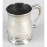 A George II silver baluster mug.