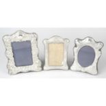 A group of four modern silver mounted photograph frames (4).