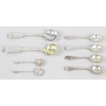 A selection of condiment spoons to include a Victorian silver Fiddle pattern example, etc. (8).