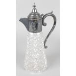 A modern silver mounted glass claret jug.