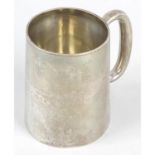 An Edwardian silver christening mug.