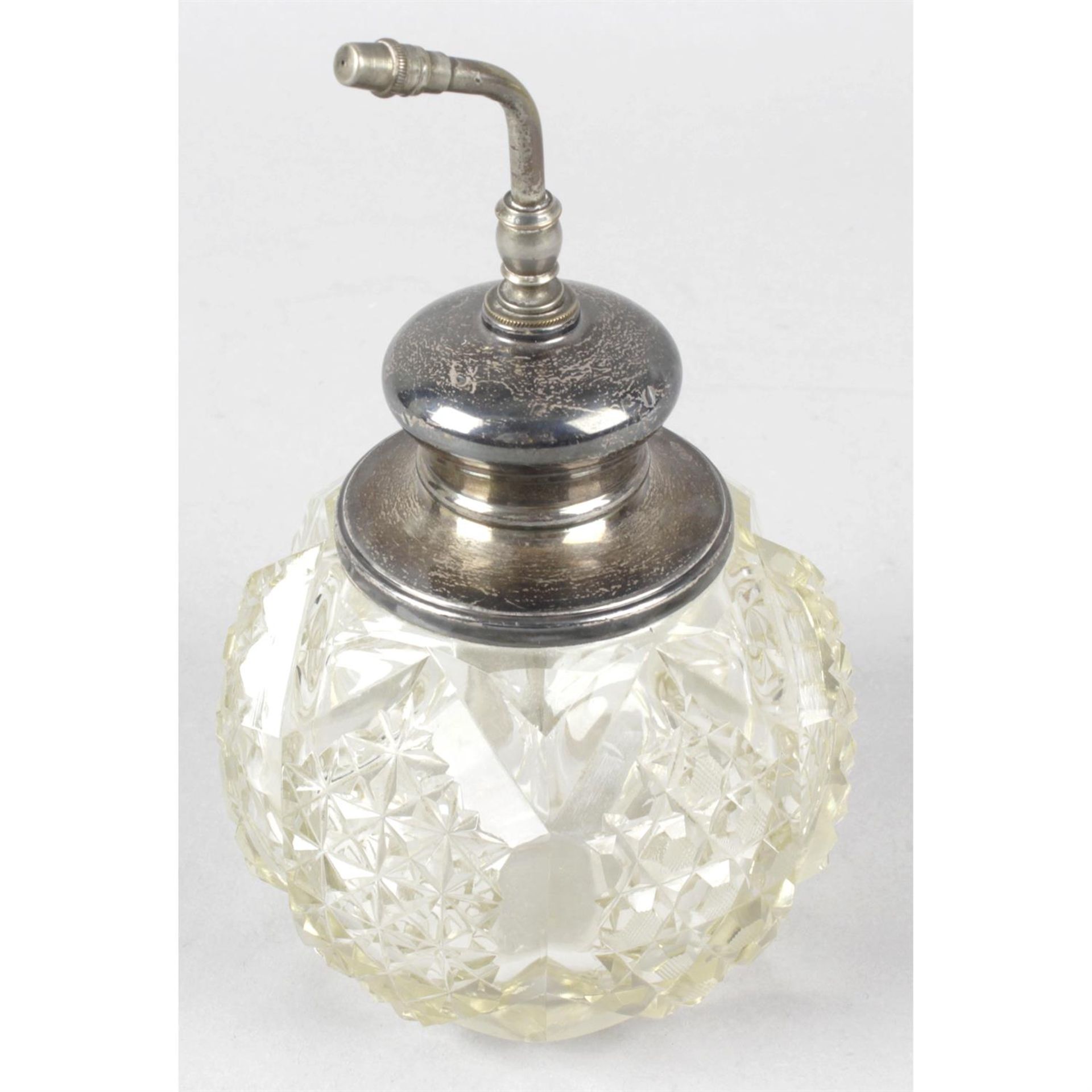A part silver mounted cut glass perfume atomiser.