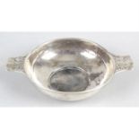An early George V planished silver twin-handled bowl.