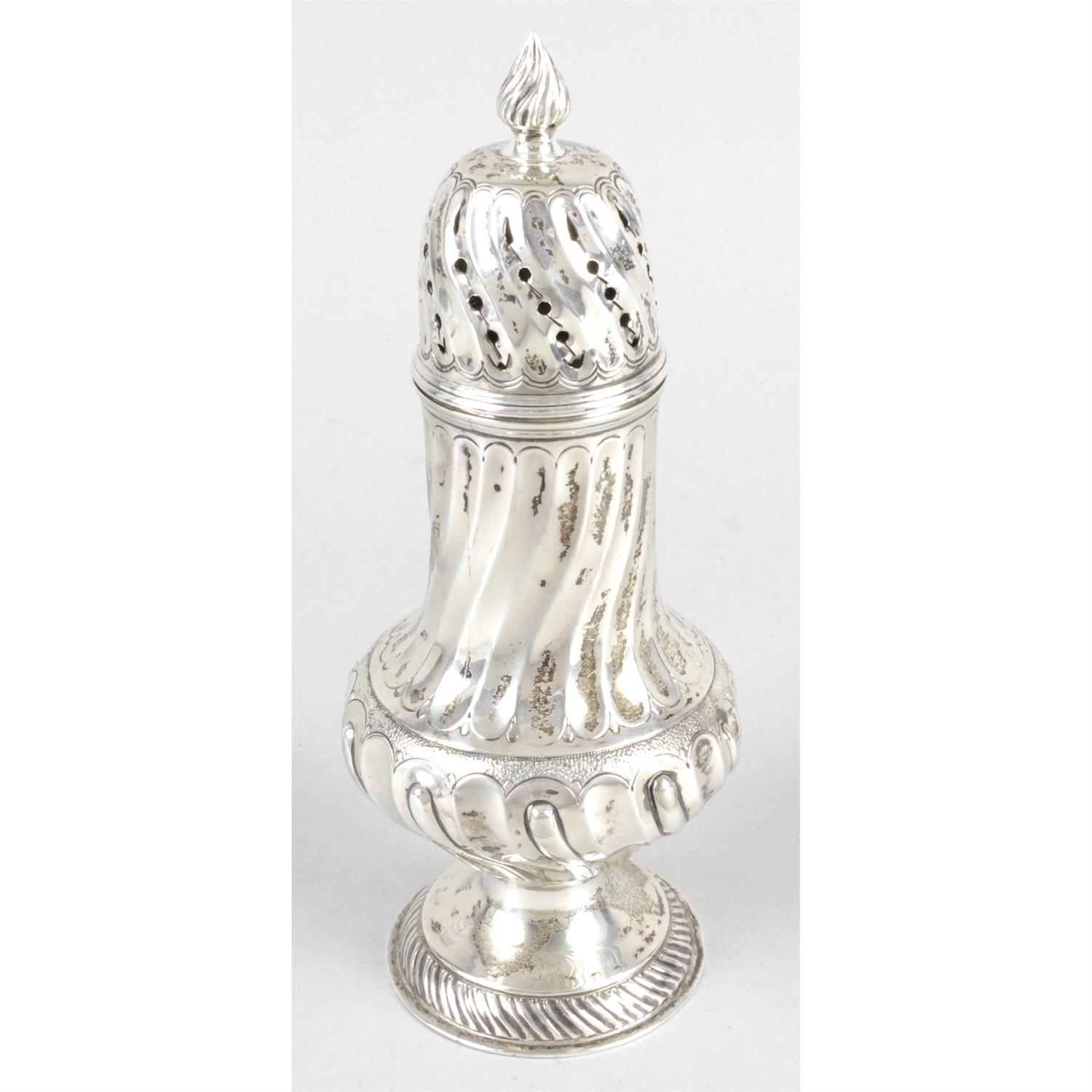 A late Victorian silver sugar caster.