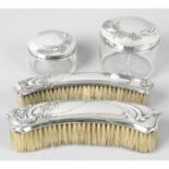 An Italian Art Nouveau style silver mounted dressing table set.