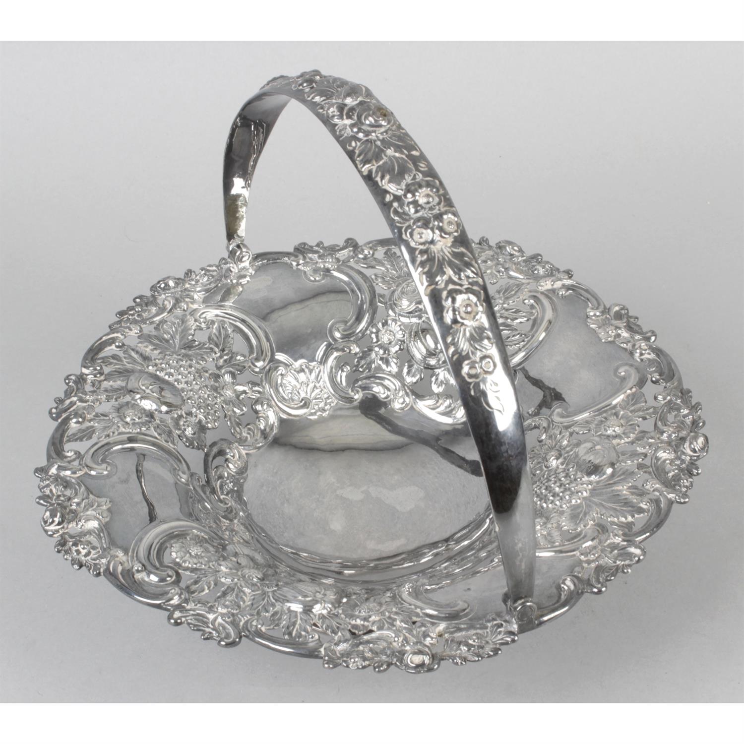 A George IV silver pierced dish with swing handle. - Image 2 of 4
