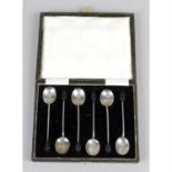 Two cased sets of silver coffee spoons.