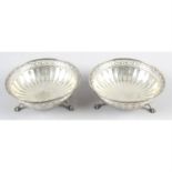 A pair of early George V silver bonbon dishes.