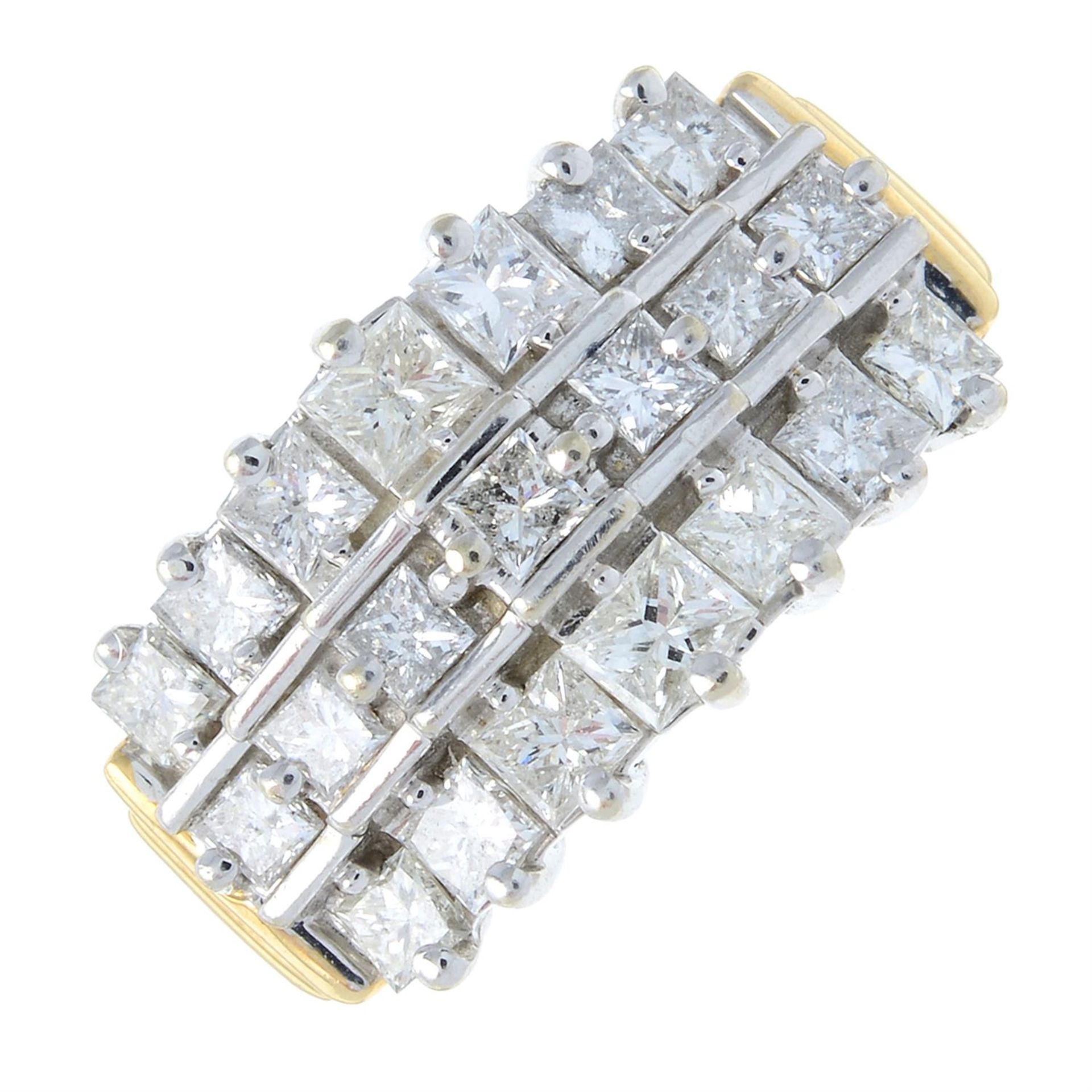 A 14ct gold square-cut diamond three-row dress ring.
