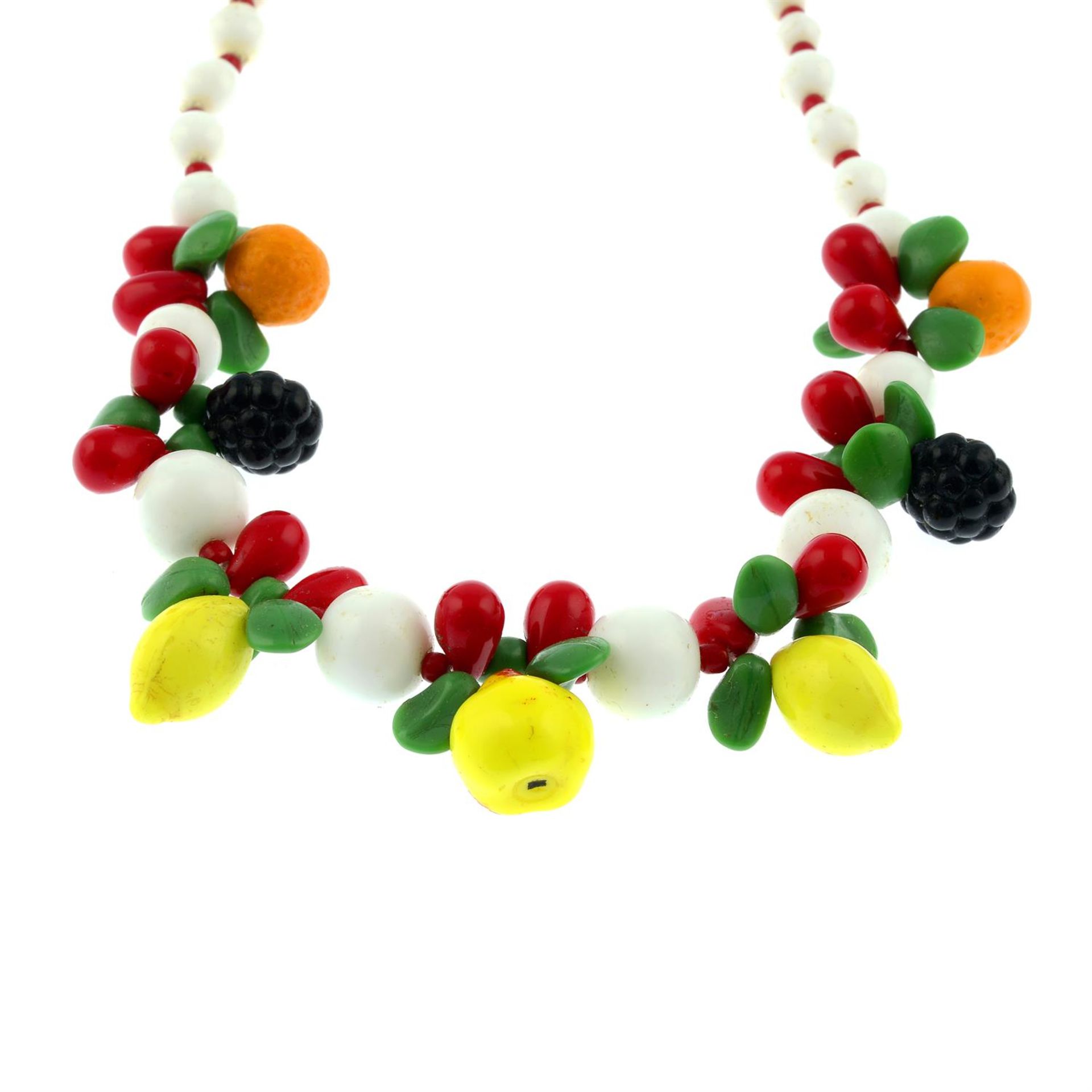 An early 20th century pressed glass fruit necklace.