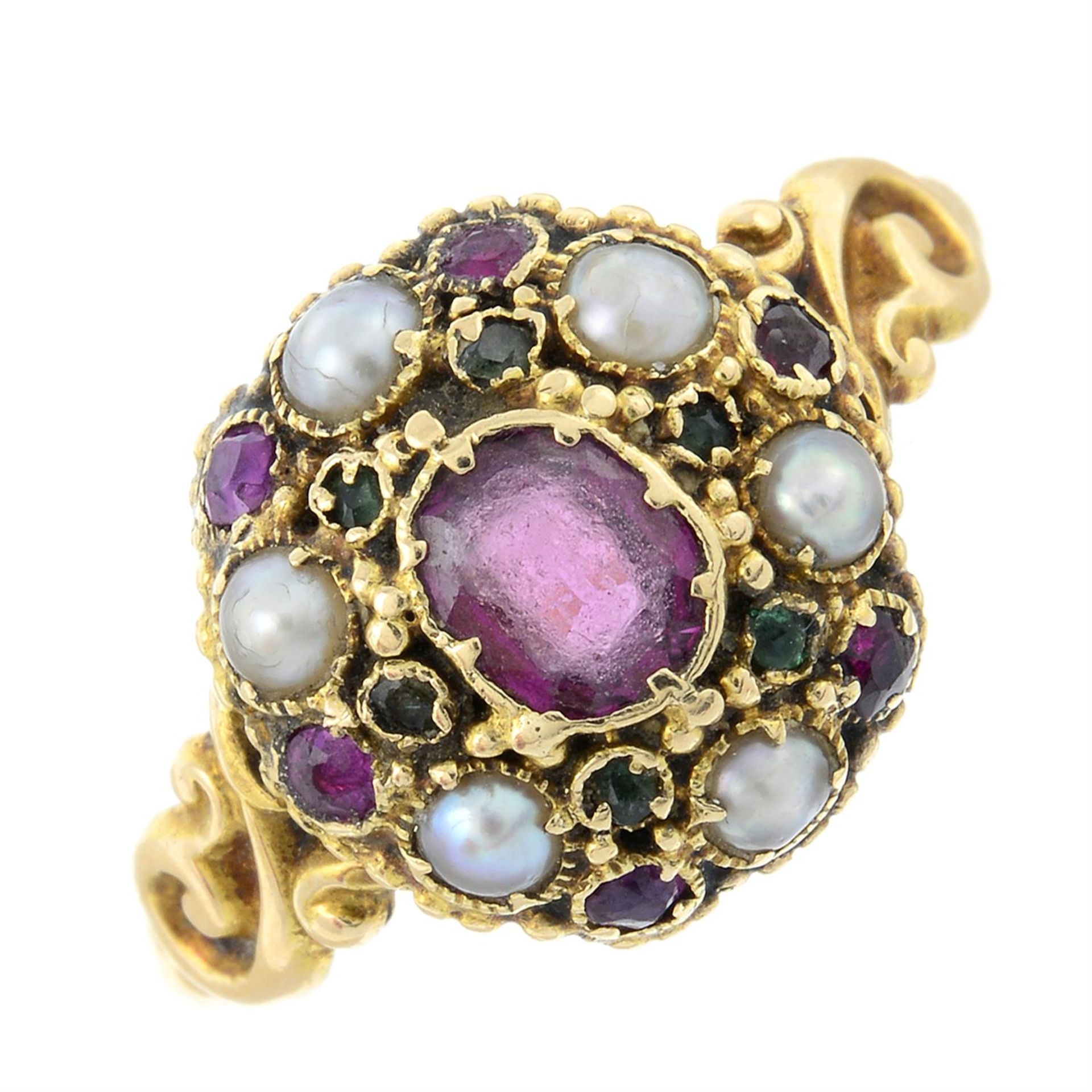 A mid 19th century 15ct gold garnet, emerald and split pearl ring.