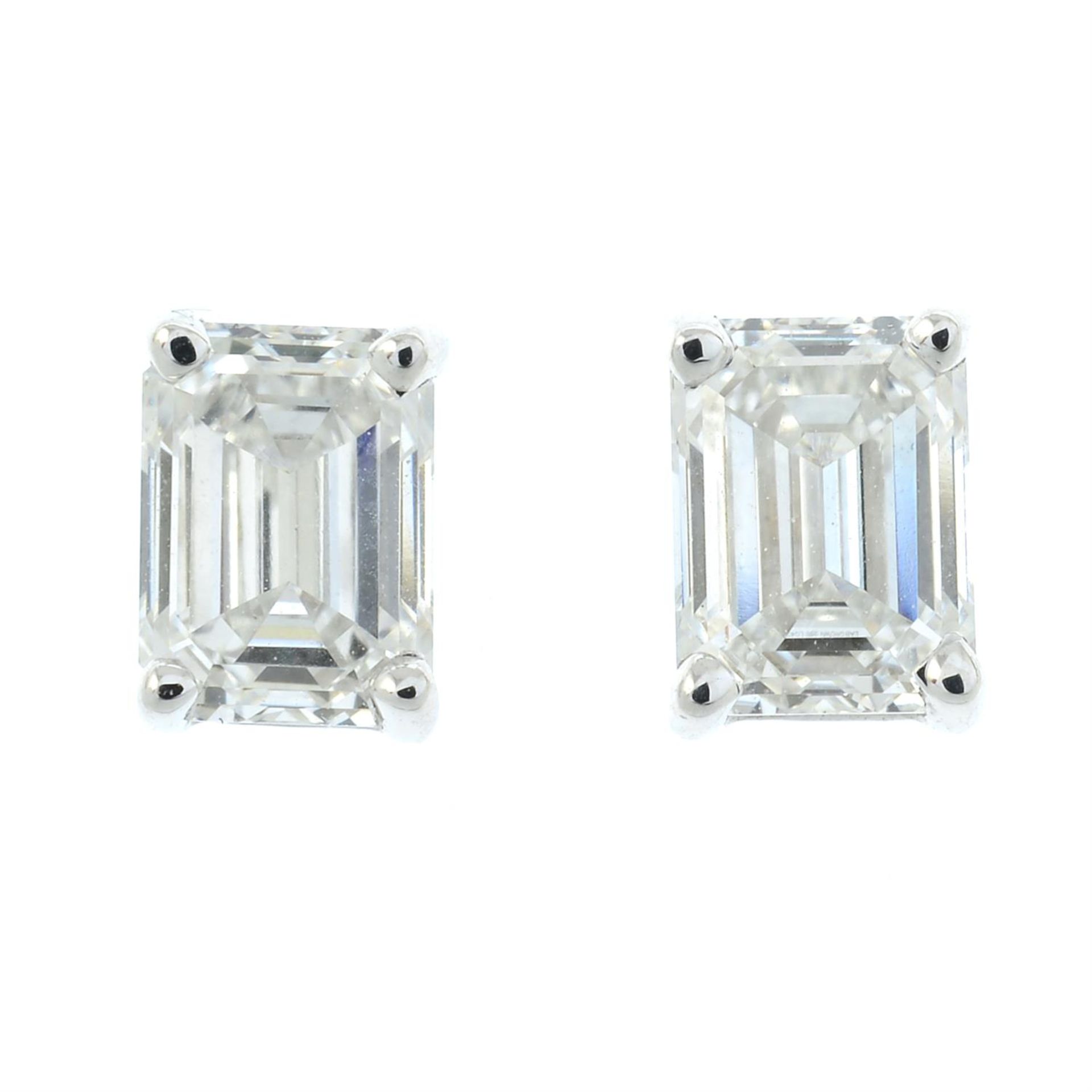 A pair of 18ct gold rectangular-shape synthetic diamond stud earrings.