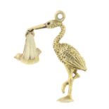 A 9ct gold stork pendant / charm, with enamel detail.