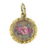An 19th century glazed locket, with embroidered motif.