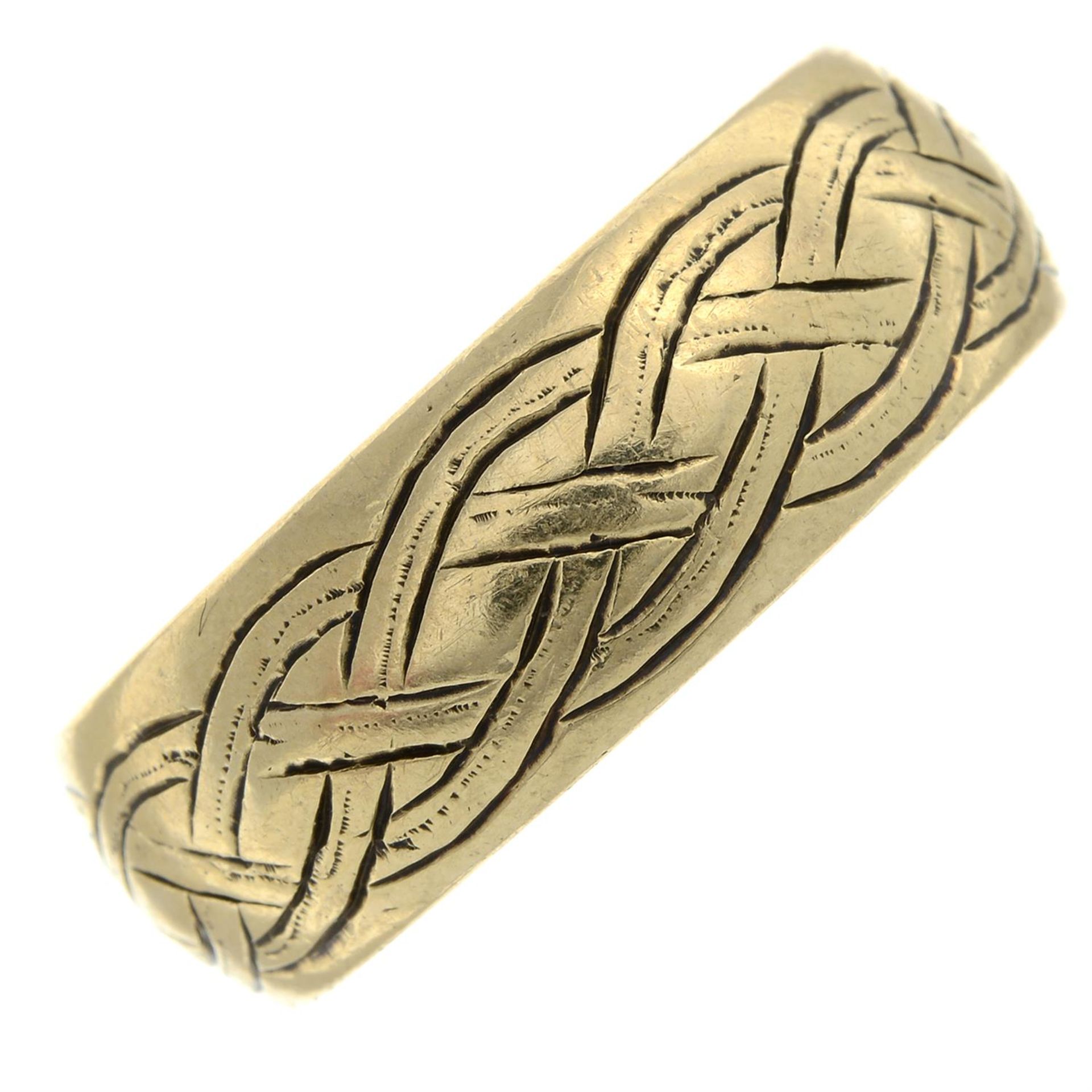 A 9ct gold band ring.