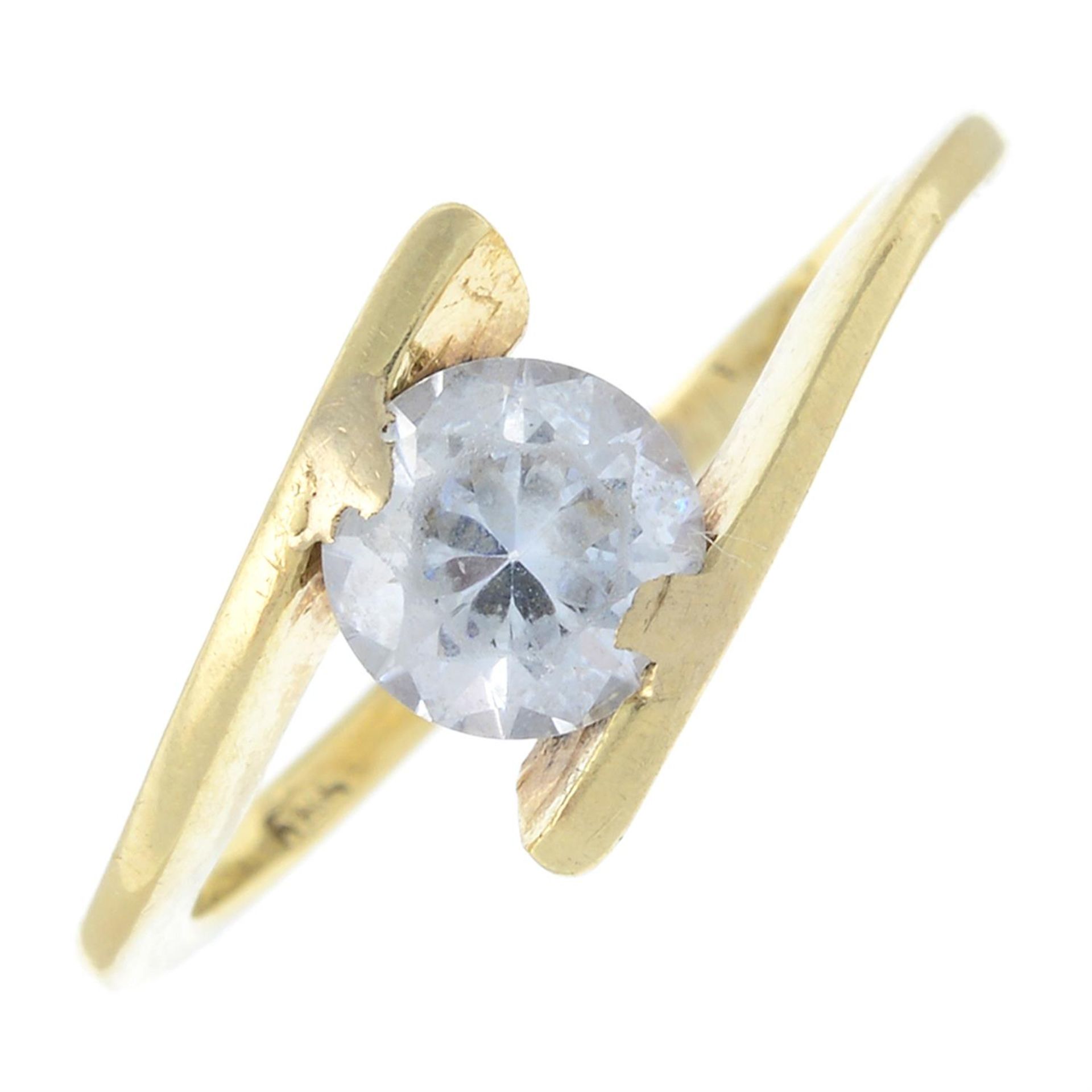 A cubic zirconia single-stone crossover ring.