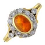 An 18ct gold fire opal and diamond ring.