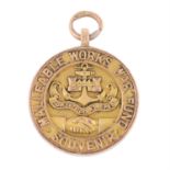 An early 20th century 9ct gold World War I 'Malleable Works War Fund Souvenir' medal.