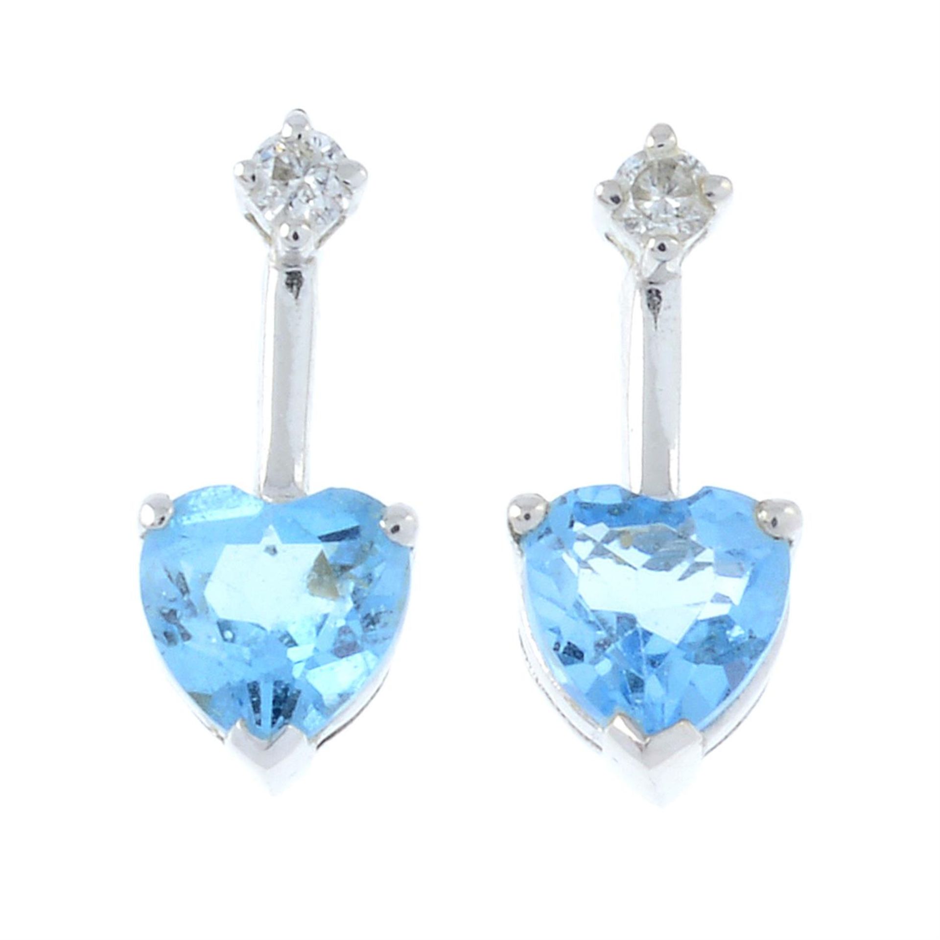 A pair 18ct gold brilliant-cut diamond and heart-shape topaz stud earrings.