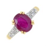 An 18ct gold ruby and pave-set diamond ring.