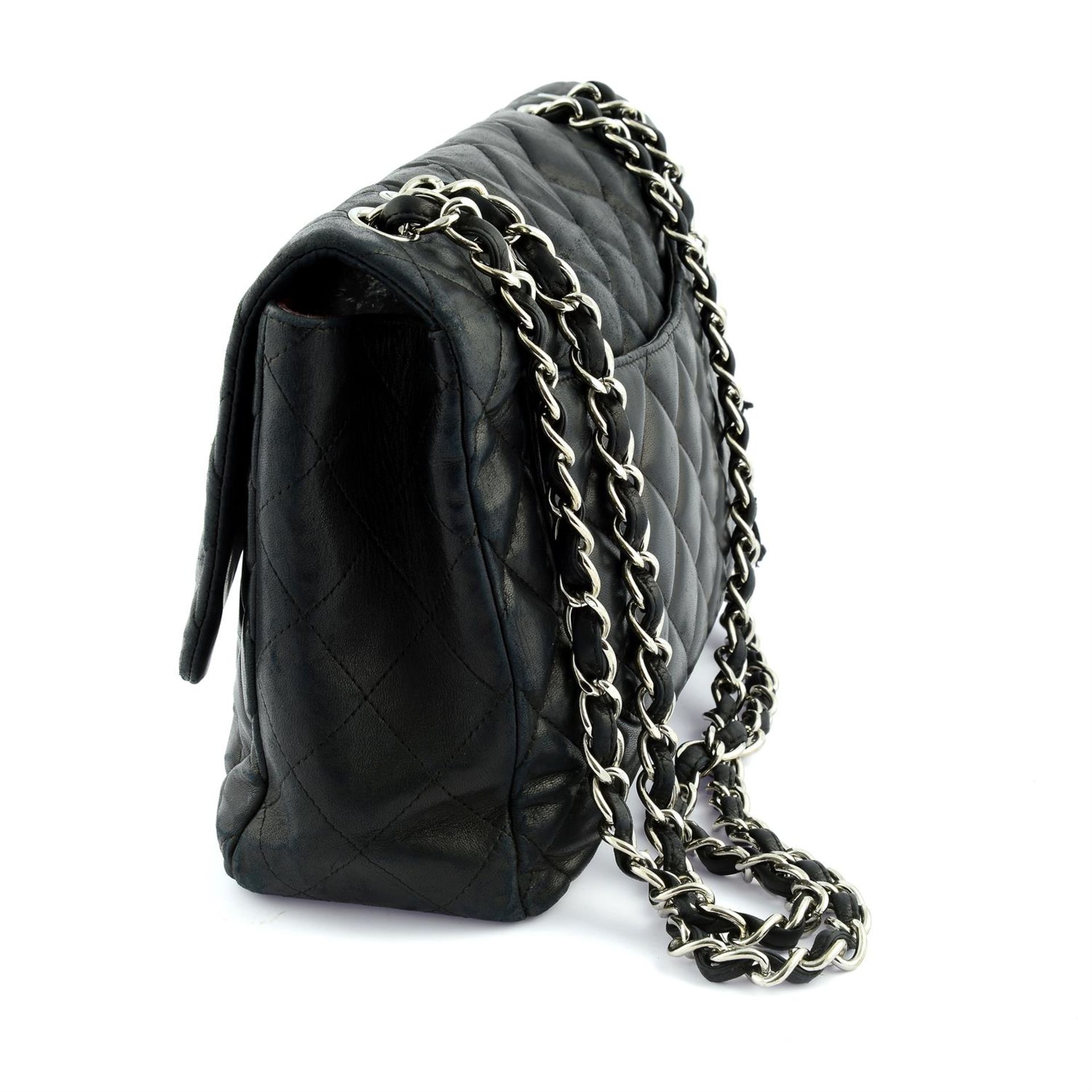 CHANEL - a black lambskin single flap Jumbo bag. - Image 3 of 10