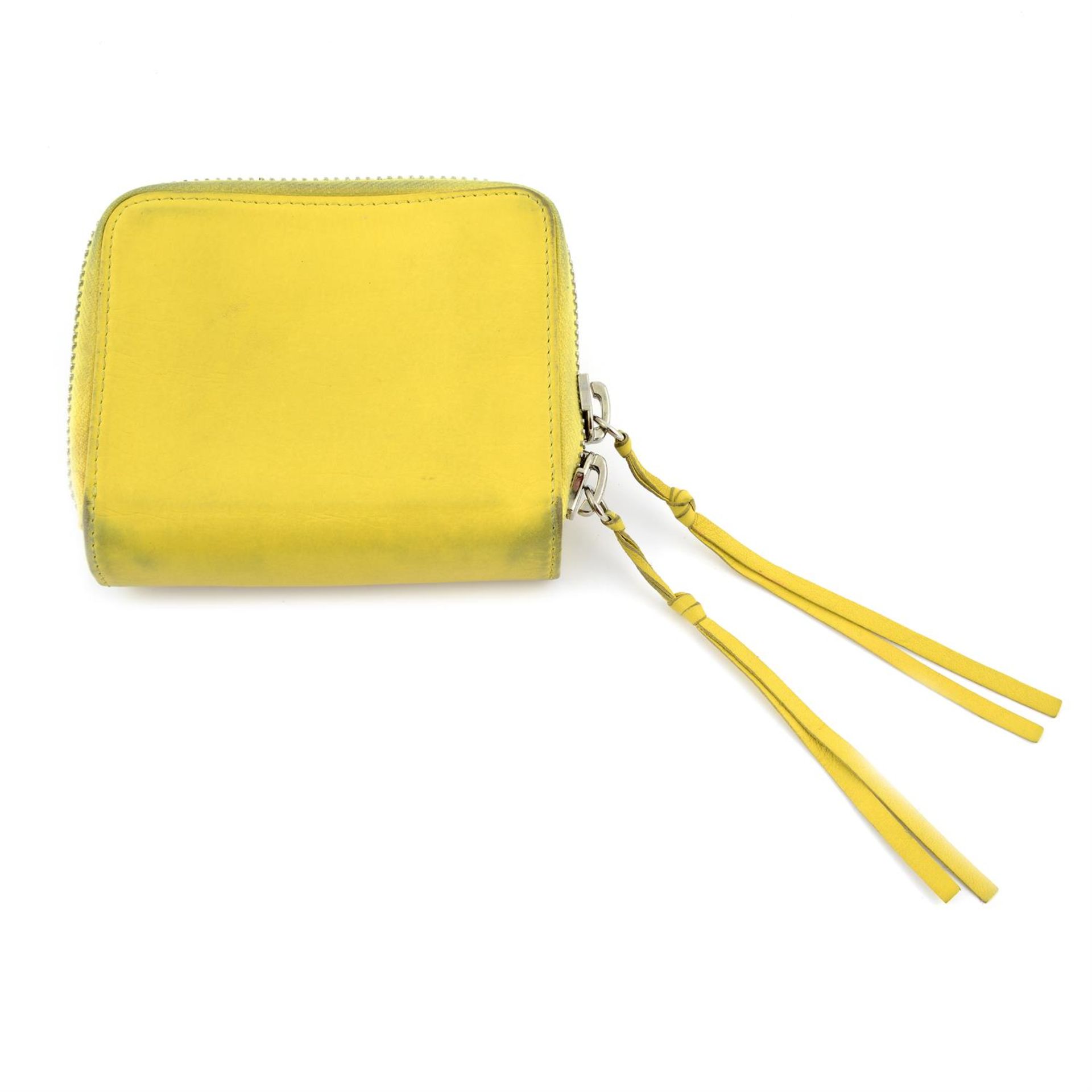 BALENCIAGA - a chartreuse leather compact wallet. - Image 2 of 5