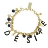 DOLCE & GABBANA - a Desire perfume bracelet.