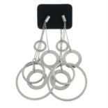 DKNY - a pair of drop earrings, bracelet and earring set.
