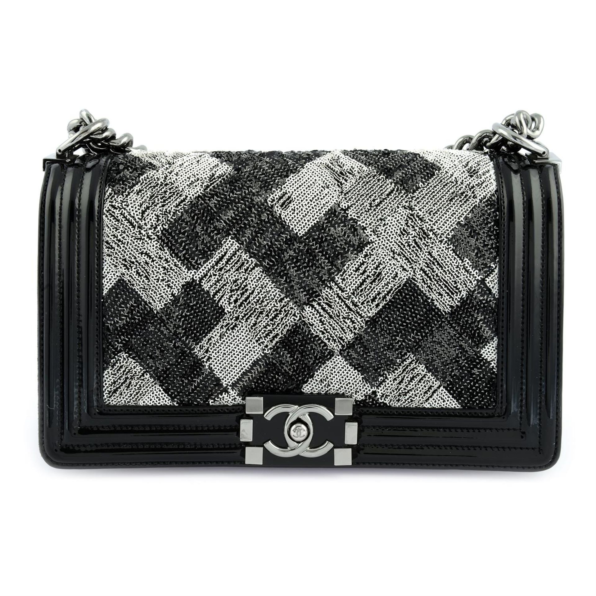 CHANEL- a patent leather sequin boy bag.