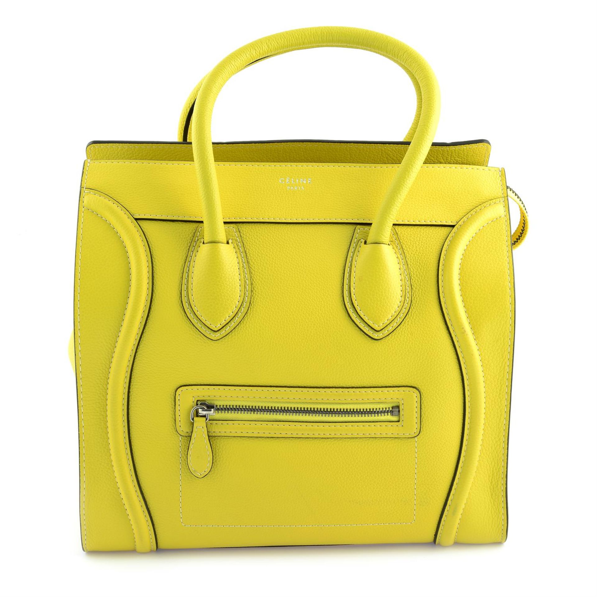 CÉLINE- a mustard yellow leather Phantom bag.