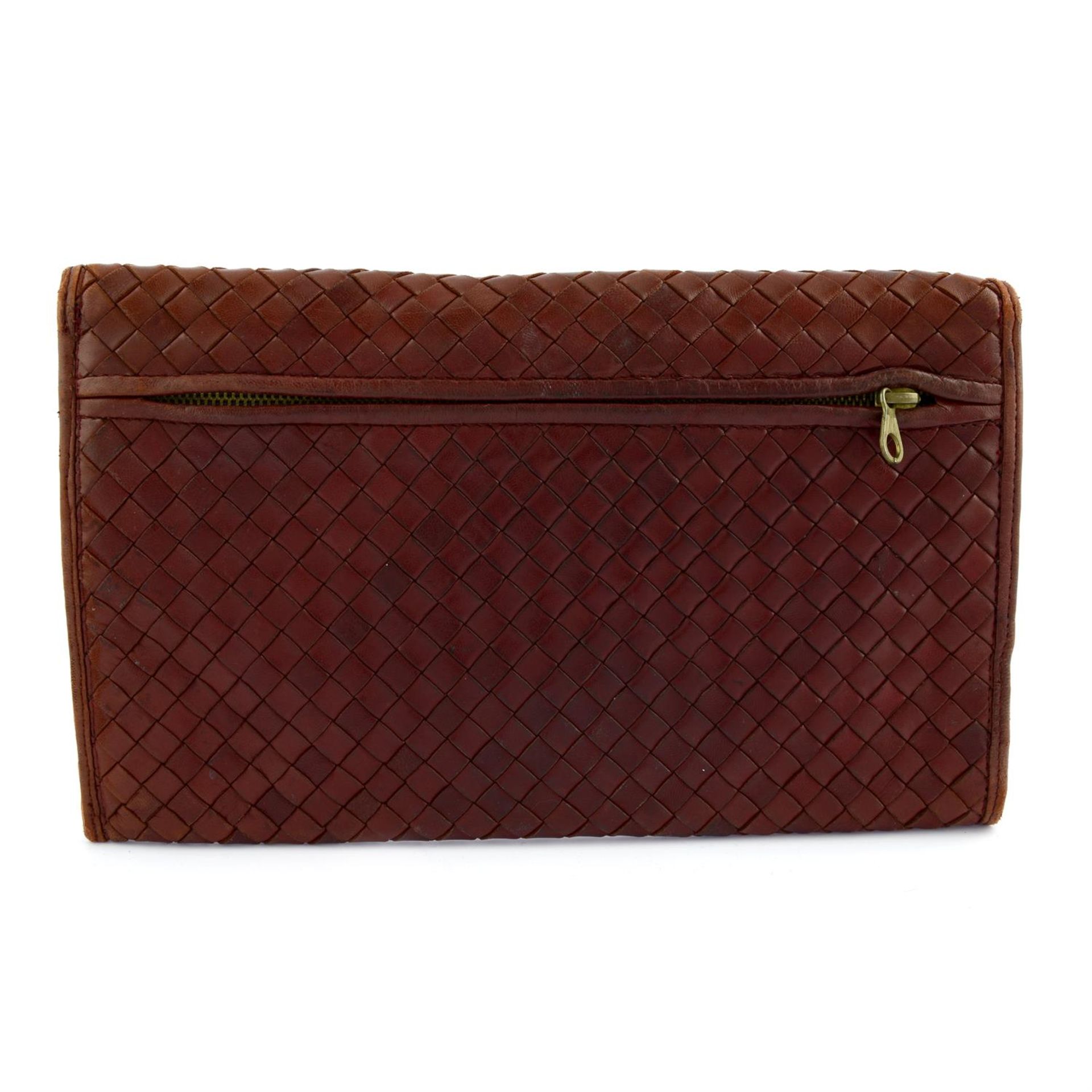 BOTTEGA VENETA - a brown leather clutch bag. - Image 2 of 4