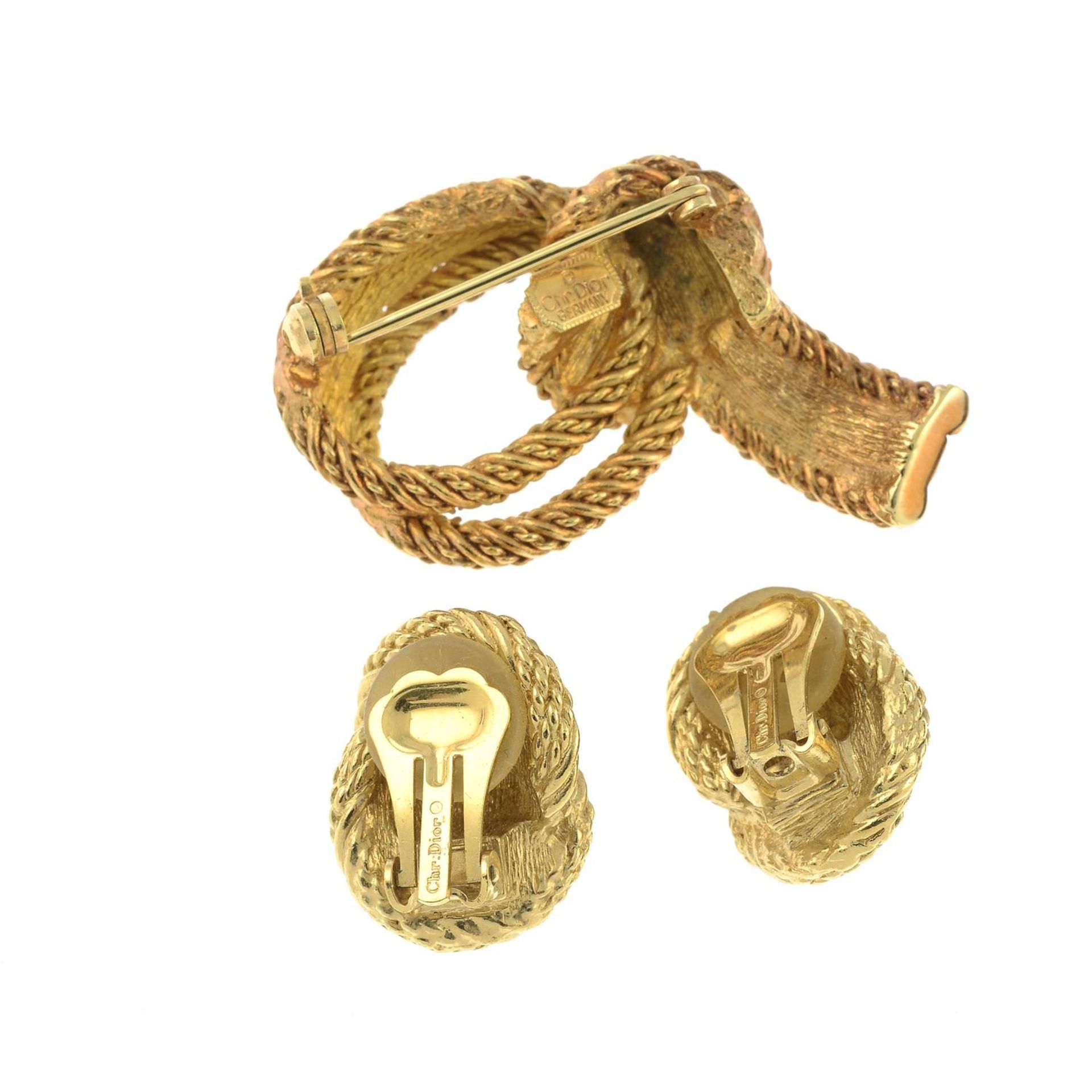 CHRISTIAN DIOR - a knot brooch and a pair of clip-on earrings. - Image 2 of 2