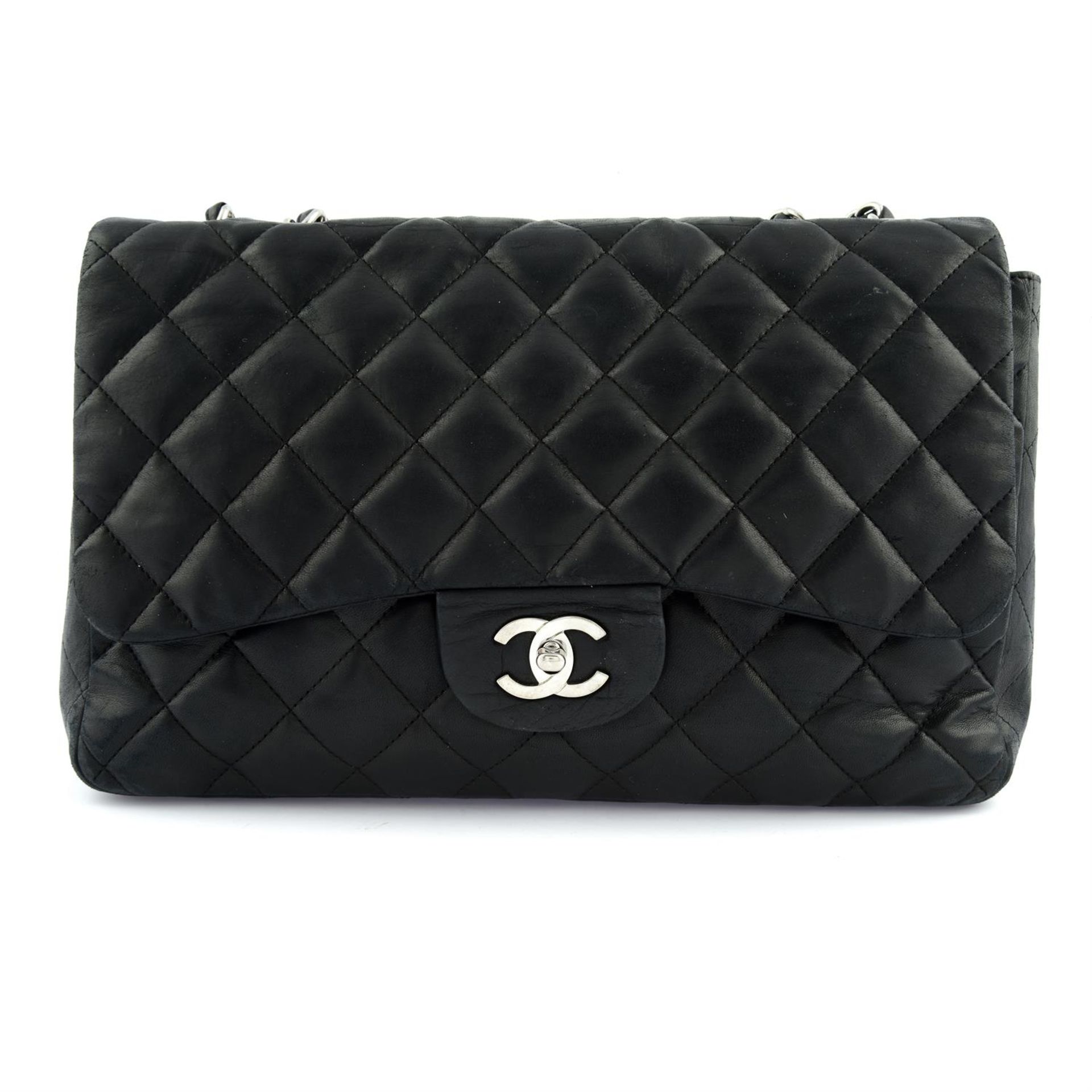 CHANEL - a black lambskin single flap Jumbo bag.