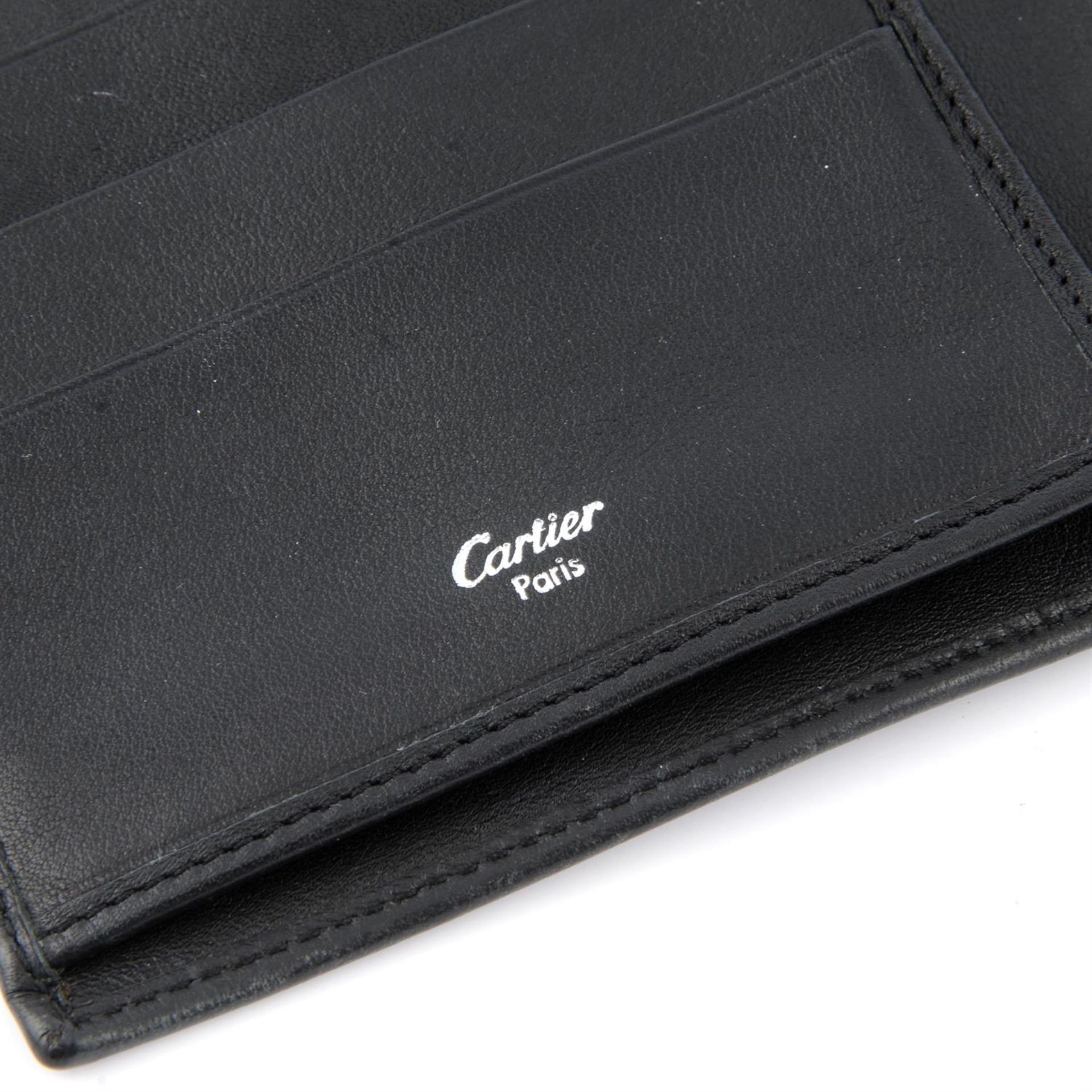 CARTIER - a black leather tri fold Trinity wallet. - Image 4 of 4
