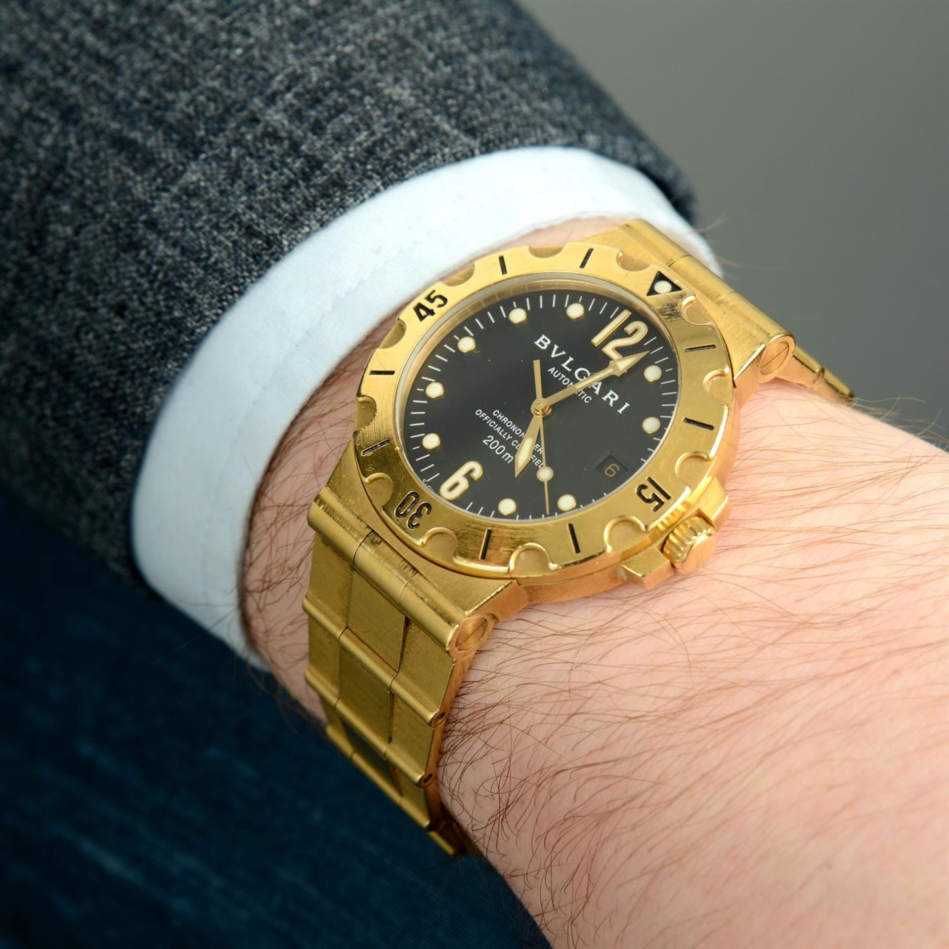 BULGARI - an 18ct yellow gold Diagono Scuba bracelet watch, 38mm. - Image 5 of 5
