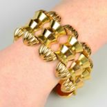 A 1940s bi-colour 18ct gold 'tank' bracelet.