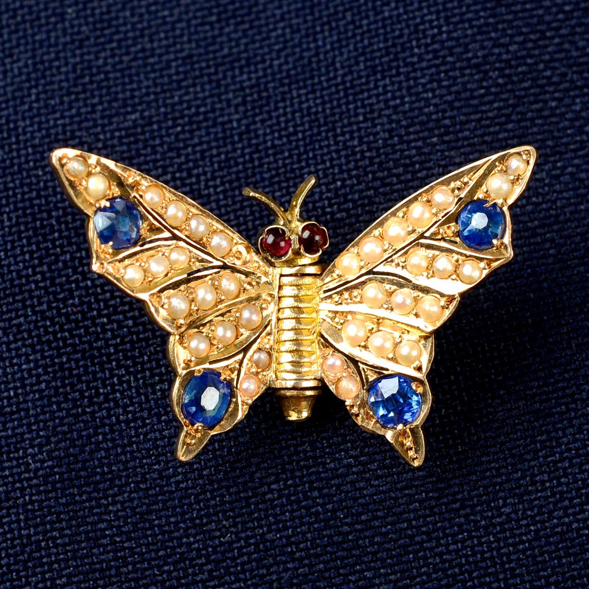 A mid 20th century gold split pearl, sapphire and garnet butterfly clip, by René Boivin.