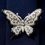 A brilliant-cut diamond, pink sapphire, onyx and black enamel butterfly brooch, the wings hinged on