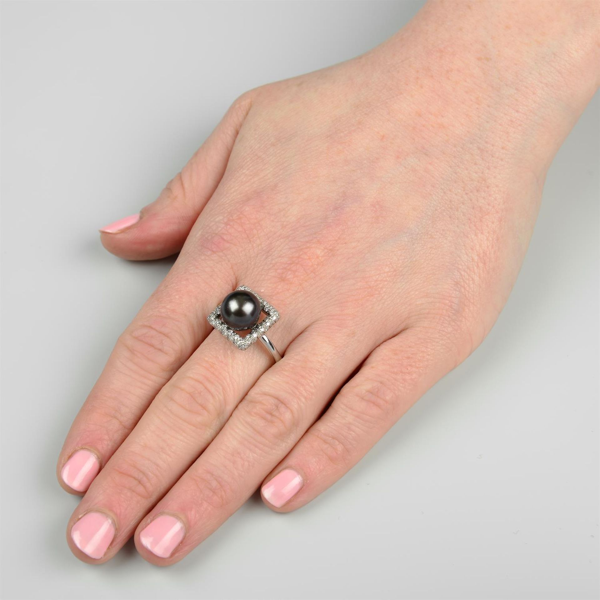 An 18ct gold 'Tahitian' cultured pearl and diamond ring, by Mikimoto. - Image 6 of 6