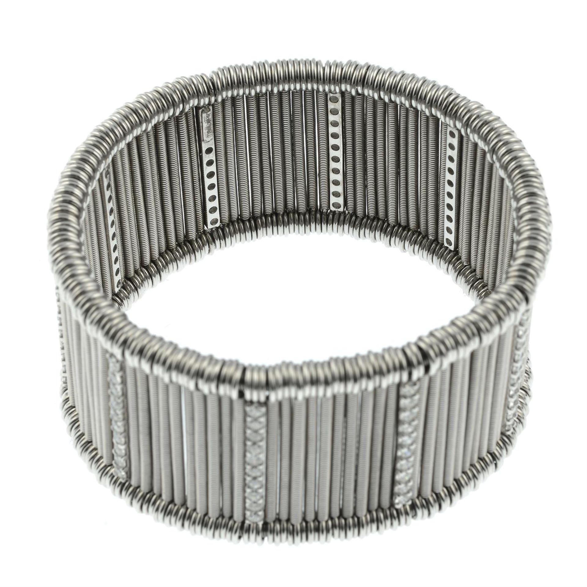 An 18ct gold, stainless steel and brilliant-cut diamond 'Shanghai' bracelet cuff, by Jarretiere. - Image 3 of 4