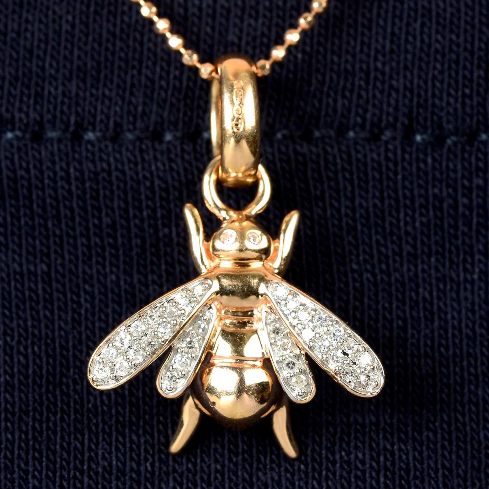 An 18ct gold diamond honey bee pendant, with chain, by Links of London.