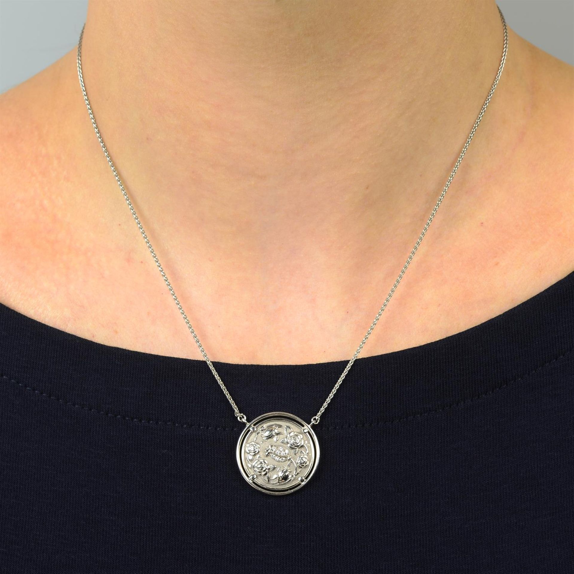 A diamond highlight, chased floral pendant on chain, by Carrera y Carrera. - Image 5 of 5