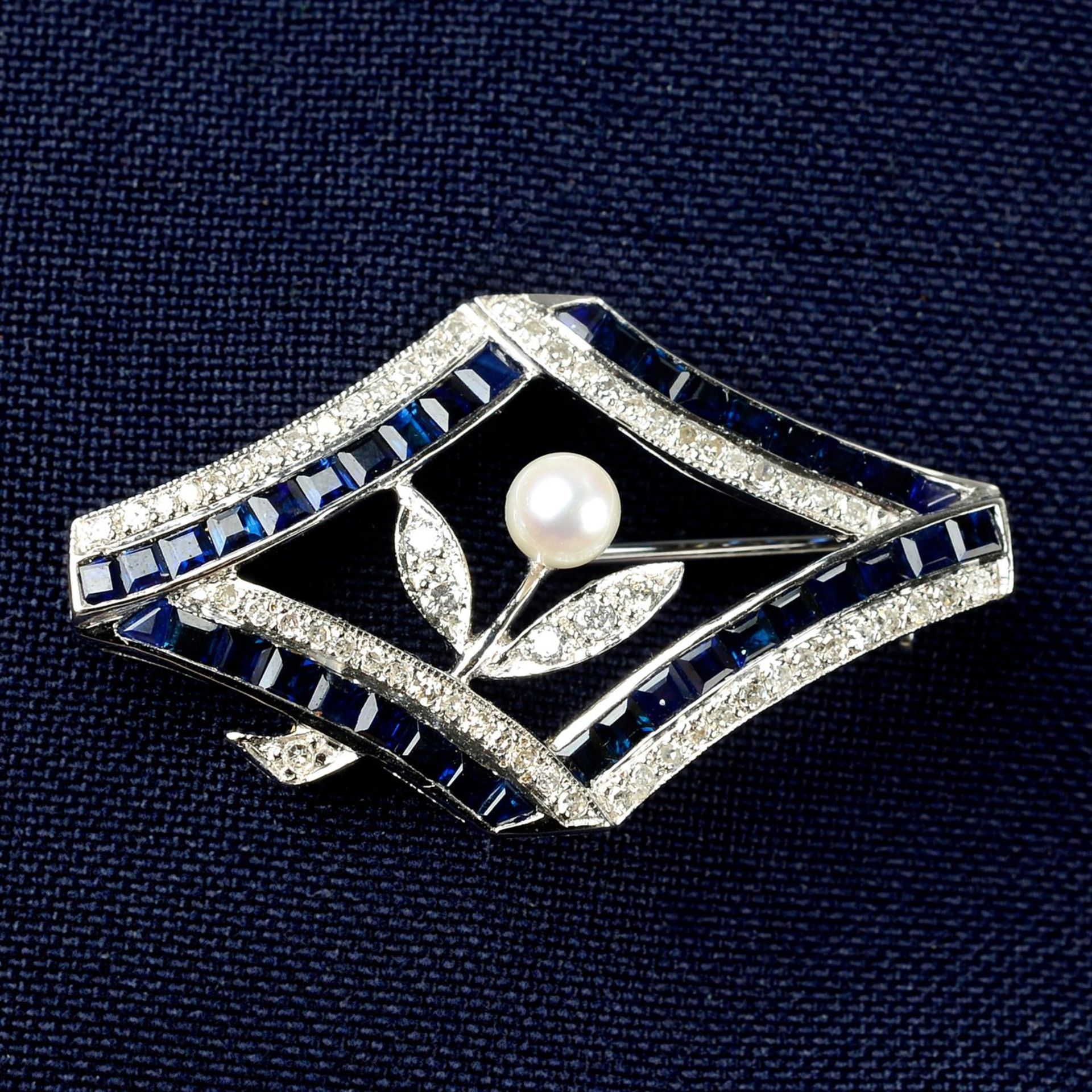 A brilliant-cut diamond, sapphire and seed pearl floral brooch.