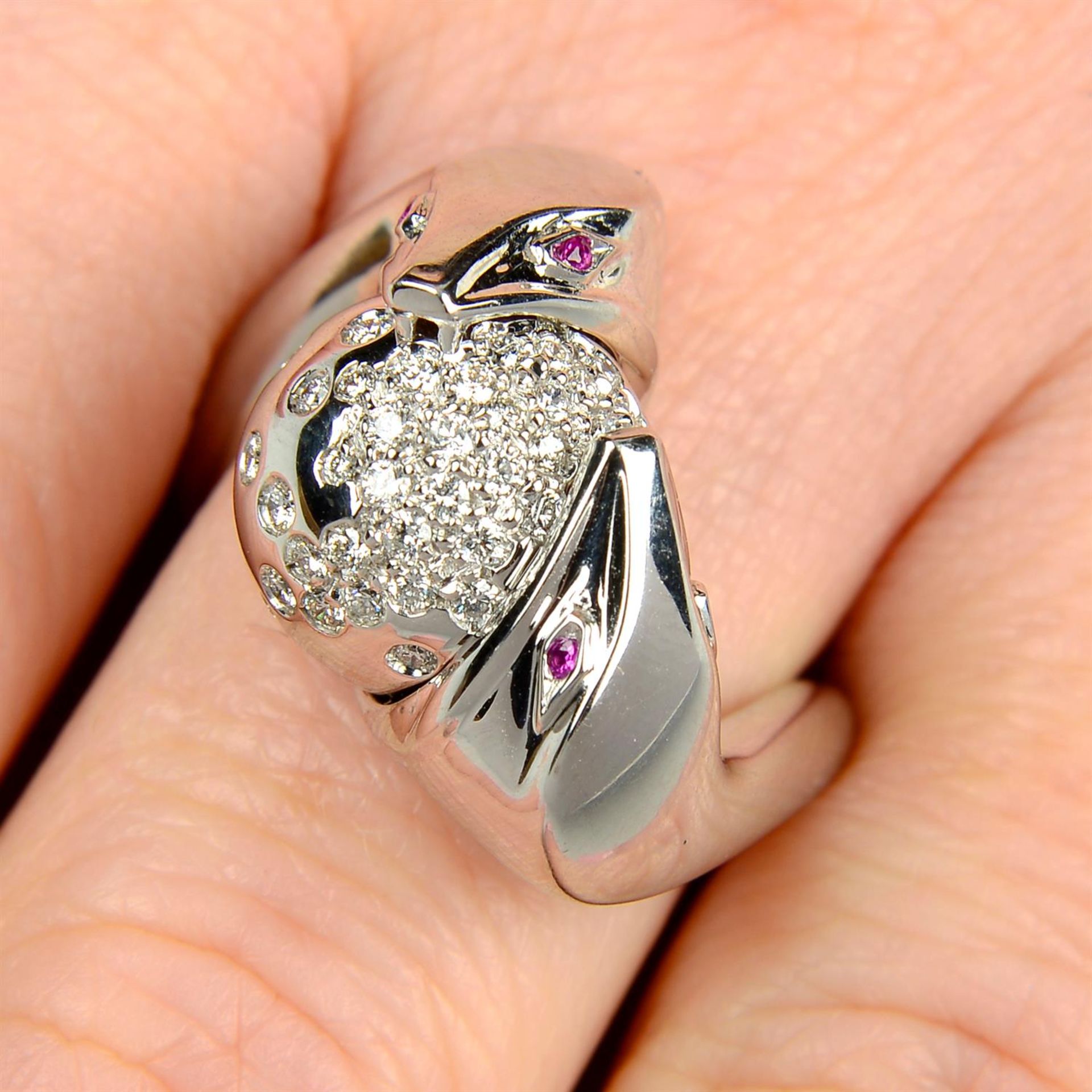 A brilliant-cut diamond snake 'Trouble' ring, by Boucheron.