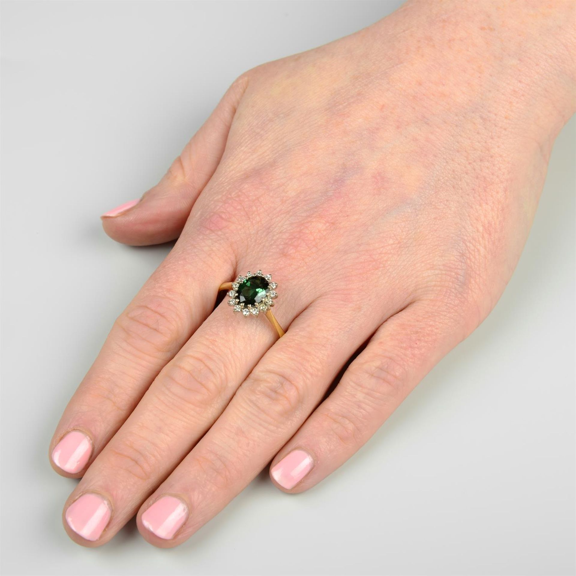 An 18ct gold green tourmaline and brilliant-cut diamond cluster ring. - Image 5 of 5