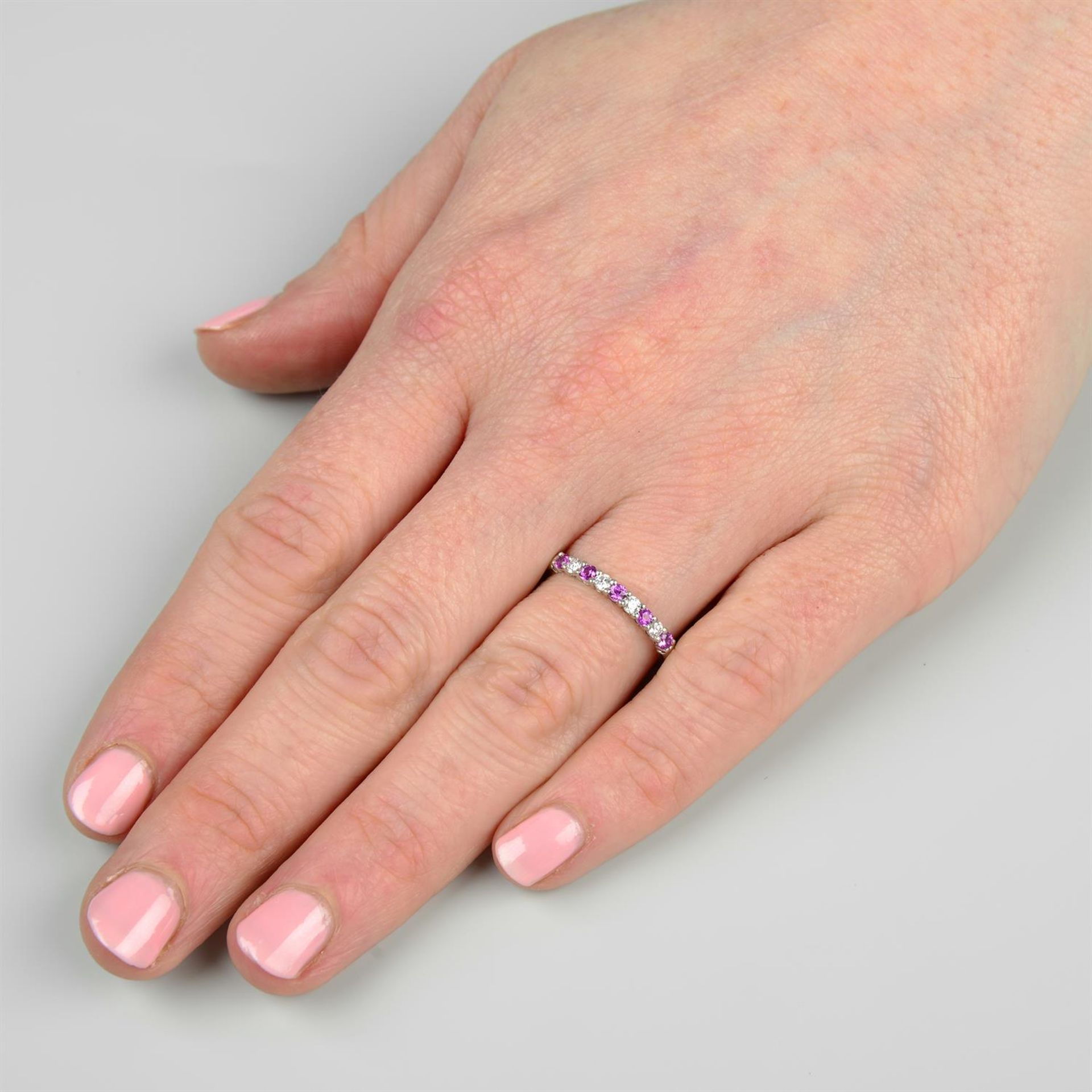 A platinum pink sapphire and brilliant-cut diamond band ring, by Tiffany & Co. - Image 6 of 6